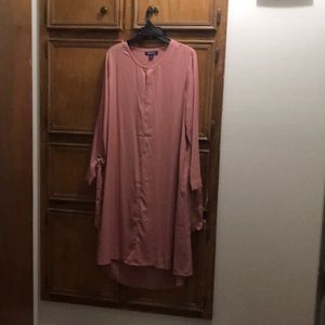 A blush tie-sleeve trapeze dress.